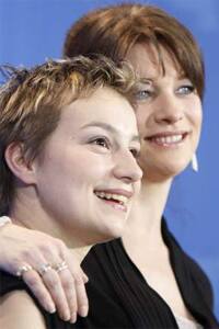 Close-up smile: Anamaria Marinca and Kerry Fox promote 'Storm' at the Berlinale film festival.