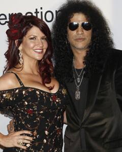 Perla Hudson and Slash at the Clive Davis pre-Grammy party .