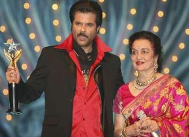 Anil Kapoor holds a special award for his film 