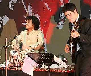 Tabla maestro Zakir Hussain playing a fusion piece at The Living Dream” concert in Siri Fort. 