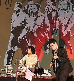 Ustad Zakir Hussain perfoms at a concert to mark the 50th anniversary of Martin Luther King`s visit to India.