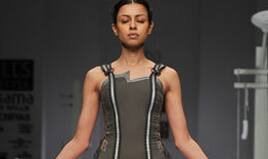 Nitin Bal Chauhan offers a yogic ensemble, emphasising the peace in a grey dhoti-shaped gown