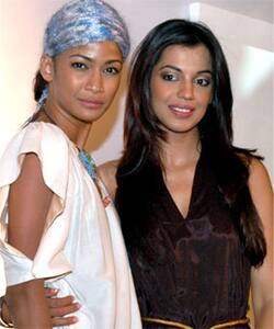 Double dash: Mugdha Godse and model Carol Gracious pose during the launch of two channels of Deutsche Welle in Mumbai.