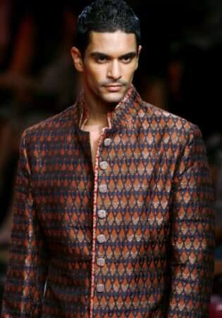 Bishan Singh Bedi's son Angad Bedi displays a Manish Malhotra creation at LFW.