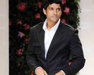 Farhan Akhtar walks the ramp during the 'Mai Mumbai' fashion show at 'Lakme Fashion Week' in Mumbai.