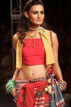 A model displays creations by Bangladeshi designer Bibi Russel during the Kolkata Fashion Week in Calcutta, India, Thursday, April 2, 2009.