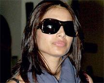 Shades of style: Bipasha Basu on way to participate in Kolkata Fashion Week.