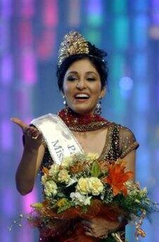 Newly selected Miss India World Pooja Chopra reacts during the Miss India Pageant 2009 in Mumbai.