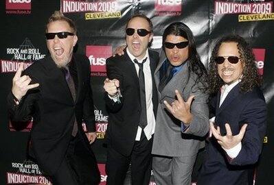 Metallica members James Hetfield, left, Lars Ulrich, Robert Trujillo and Kirk Hammett arrive on the red carpet for the 2009 Rock and Roll Hall of Fame Induction Ceremony Saturday, April 4, 2009 in Cle