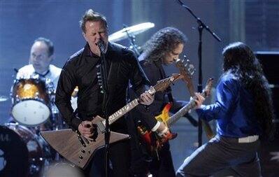 James Hetfield of Metallica performs after the band was inducted into the Rock and Roll Hall of Fame at the 2009 Rock and Roll Hall of Fame Induction Ceremony Saturday, April 4, 2009 in Cleveland.