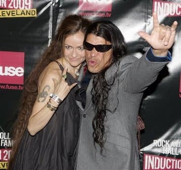 Metallica bassist Robert Trujillo, right, and his wife Chloe arrives on the red carpet for the 2009 Rock and Roll Hall of Fame Induction Ceremony Saturday, April 4, 2009 in Cleveland.