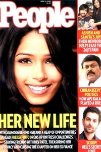 Close-up of 'fame': Freida Pinto grins at her fortune on the cover of 'People' magazine.