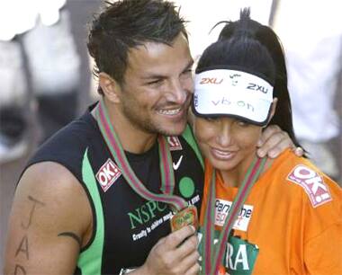 Katie Price and Peter Andre after finishing the '09 London Marathon.