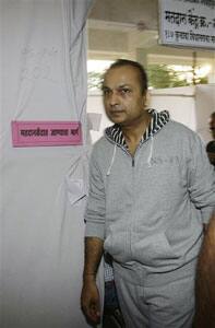 Indian billionaire Anil Ambani leaves after casting his vote at a polling station in Mumbai