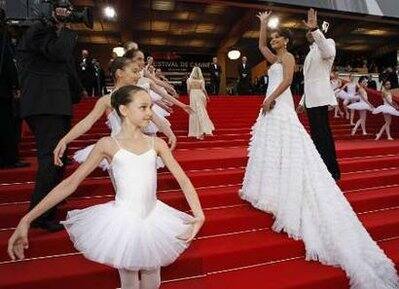 Bollywood actress Aishwarya Rai Bachchan waves as she arrives for the screening of the animated film 