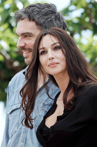 Italian actress Monica Bellucci, foreground, and Italian actor Andrea Di Stefano attend a photo call for the film 'Ne Te Retourne Pas' (Don't Look Back) during the 62nd International film festival in 