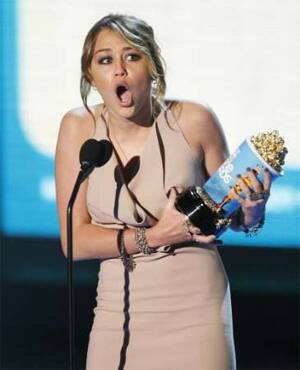 Miley Cyrus wins Best Song for 'The Climb' in 'Hannah Montana: the Movie' at the MTV Awards in LA.