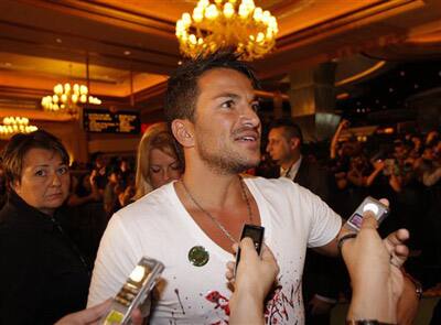 Singer Peter Andre is interviewed as he arrives at the 10th International Indian Film Academy in Macau.