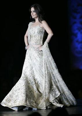 Bollywood actress Dia Mirza preforms at a fashion show one day before the 10th International Indian Film Awards presentation at a casino-hotel complex in Macau.