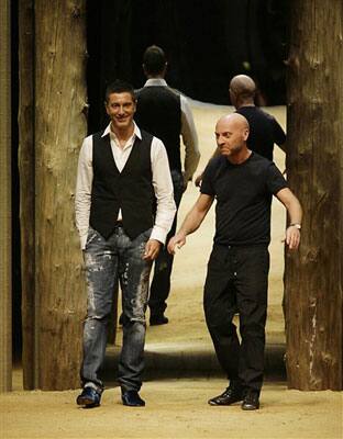 Domenico Dolce and Stefano Gabbana make a short appearance on the catwalk at the end of the D&G Spring/Summer 2009/2010 men's collection, presented in Milan, Italy, Tuesday, June 23, 2009.