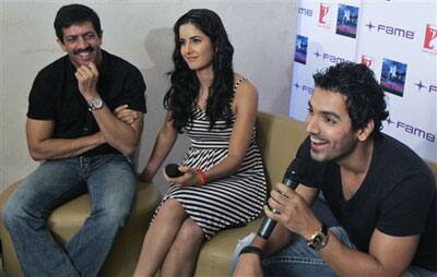 Bollywood actor John Abraham, right, speaks as actress Katrina Kaif, center, and filmmaker Kabir Khan look on during a promotional event of their upcoming movie 'New York' in Bangalore, India, June 24