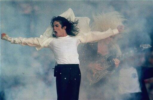 In this Jan. 31, 1993 file picture, Michael Jackson performs during the halftime show at the Super Bowl XXVII in Pasadena, Calif.