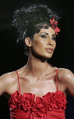 A model displays a creation by Ramesh Dembla at the Bangalore Fashion Week 2009, in Bangalore, India.