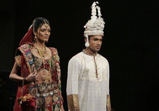 Models present creations by Suman Chowdhury at the Bangalore Fashion Week 2009, in Bangalore, India.