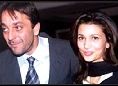 With second wife Rhea Pillai.