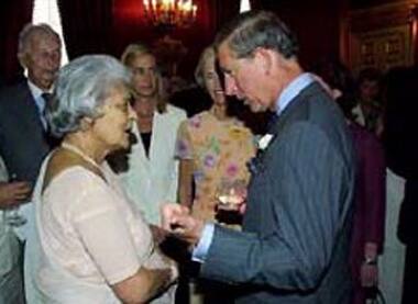 With Prince Charles during one of his visits to India.