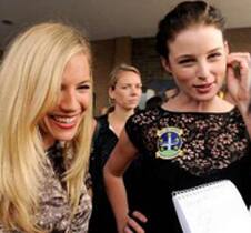 Sienna Miller and Rachel Nichols are interviewed on the red carpet as they arrive for their film's screening.