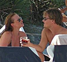 Leonardo Di Caprio mending broken heart in Ibiza with sun, beach and sex.