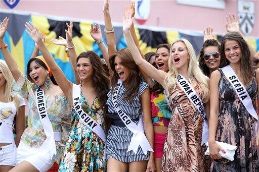 Contestants of the Miss Universe 2009 beauty pageant, from left, Miss Indonesia Zivanna Siregar, Miss Paraguay Mareike Baumgarten, Miss Puerto Rico Mayra Matos, Miss Nicaragua Indiana Sanchez, Miss Sl