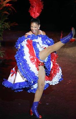 Miss France Chloe Mortaud dances during the national costume event in Nassau, Bahamas.