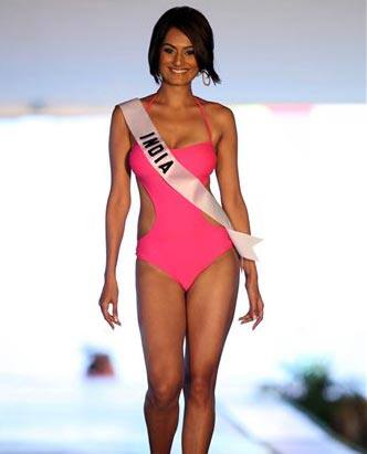 Miss India Ekta Chowdhry walks the runway during a swimsuit event in Freeport, Grand Bahama island.