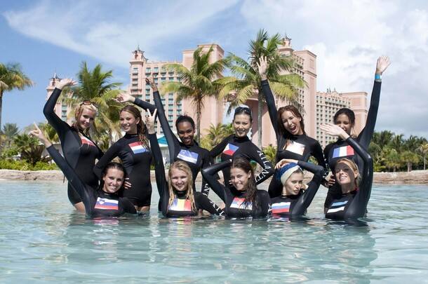 Miss Universe participants pose for a photo at Dolphin Cay Atlantis on Paradise Island, ahead of the Miss Universe 2009 pageant in the Bahamas.