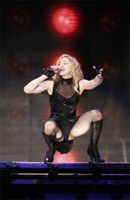 Madonna performs during her Sticky and Sweet Tour concert in Warsaw. 