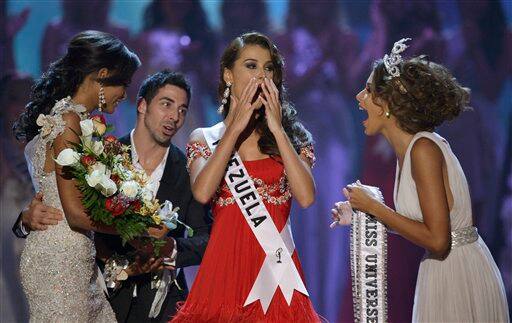 Miss Venezuela Stefania Fernandez, center, reacts as she is named Miss Universe 2009 next to Miss Universe 2008 Dayana Mendoza