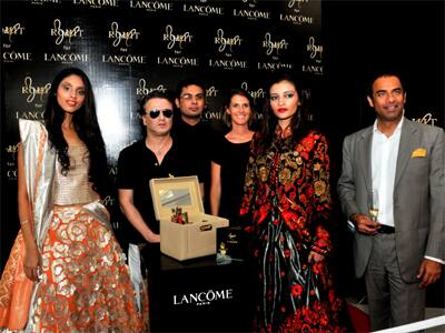 Designer Rohit Bal along with models at the launch of Lancome's boutique in Delhi.