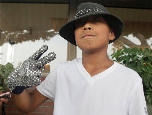 Angel Villegas, 11, of Glendale, Calif., wears a glove in honor of Michael Jackson