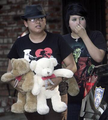 Michael Jackson fans offer gifts to the Jackson family prior to Michael Jackson's funeral at the family residence in the Encino section of Los Angeles for his son's funeral