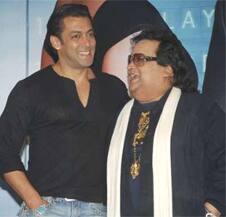 Salman Khan and Bappi Lahiri smile during the music launch of 'Main Aur Mrs Khanna'. 