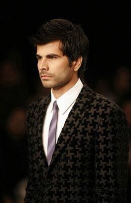 A model presents a creation by designers Abhishek Gupta & Nandita Basu at the Van Heusen India Men's Week 2009 in New Delhi