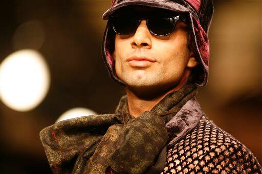 A model displays a creation by designer Rohit Bal at the Van Heusen India Mens Week 2009 in New Delhi, India.