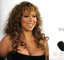 Singer - actress Mariah Carey attends a cocktail reception. 