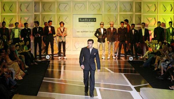 Bollywood actor Salman Khan presents a creation from Indian designer Ashish Soni during the Van Heusen India Men's Fashion Week in New Delhi September 13, 2009