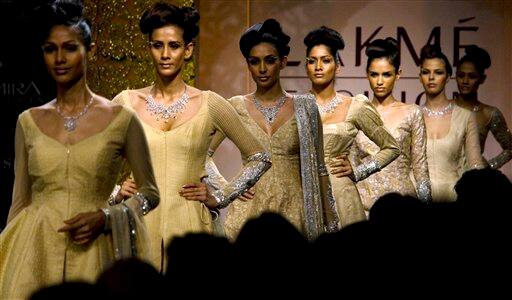 Models showcase creations of designer Neeta Lulla on the first day of Lakme Fashion Week 2009 in Mumbai, India.