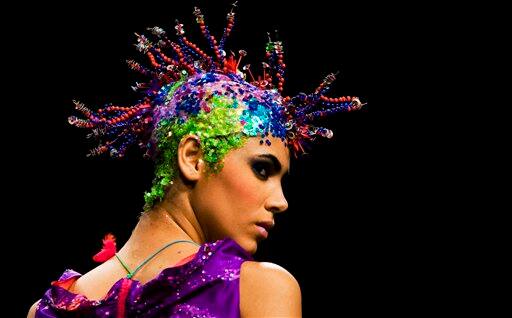 A model walks the ramp during a presentation of creations by Lakme Fashion Week grand finale designers of the past 10 years, on the first day of the Lakme Fashion Week 2009 in Mumbai, India.