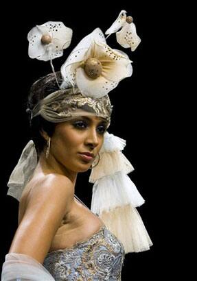 A model walks the ramp during a presentation of creations by Lakme Fashion Week grand finale designers of the past 10 years, on the first day of the Lakme Fashion Week 2009 in Mumbai, India.