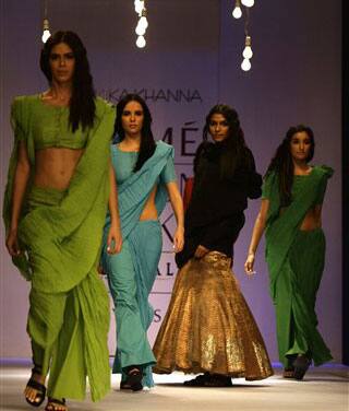 Models showcase designer Anamika Khanna's creations on the second day of the Lakme Fashion Week 2009 in Mumbai, India.